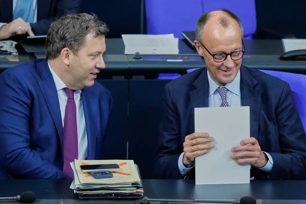 German chancellor friedrich merz and vice chancellor klingbeil attending a meeting in the german parliament