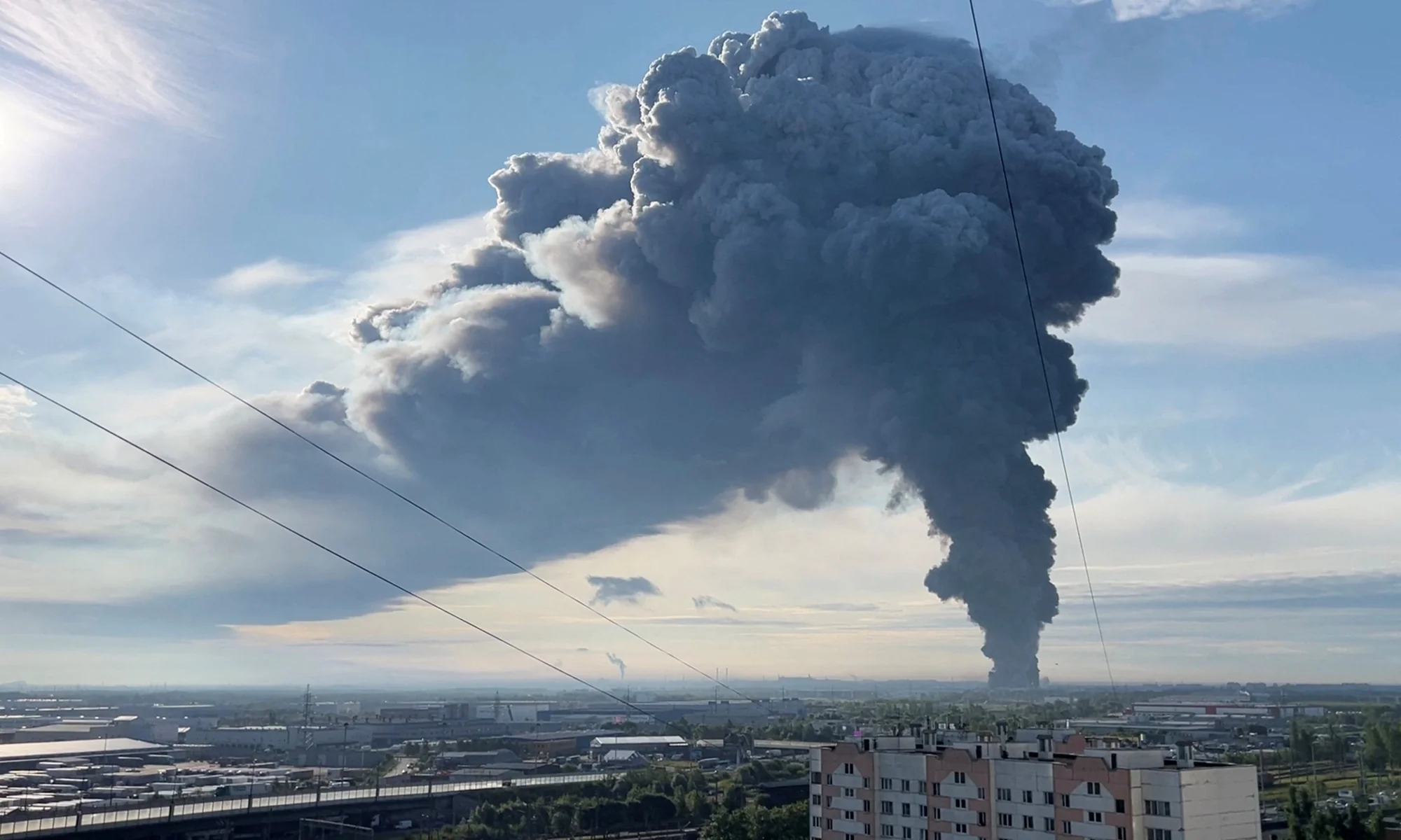 Smoke billows from the burning Wildberries warehouse following a Ukrainian drone attack, according to local authorities, in the course of the Russia-Ukraine conflict, in Saint Petersburg, Russia July 24, 2026, in this still image taken from video. REUTERS/Stringer